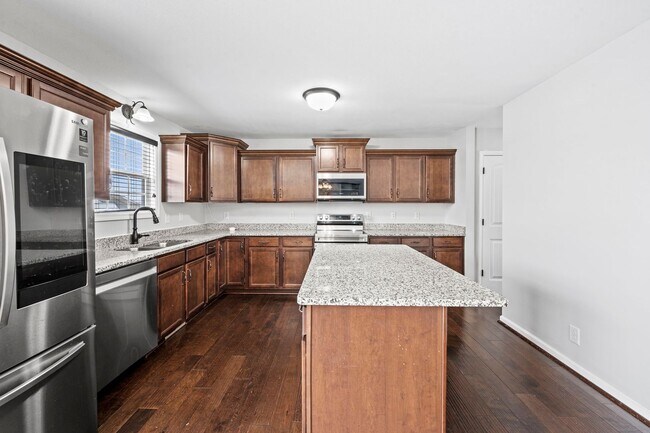 Building Photo - Move-In Special Available! Spacious 3BR Home with Bonus Room, Fireplace & Fenced Yard