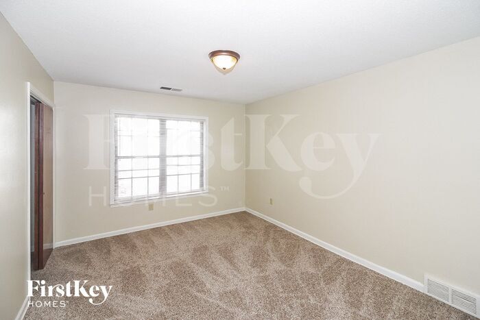 Building Photo - 4965 Gardenwood Dr