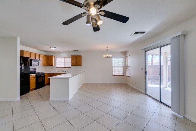 Building Photo - Spacious 4 Bedroom 2.5 Bathroom Home with Covered Patio & Large Backyard