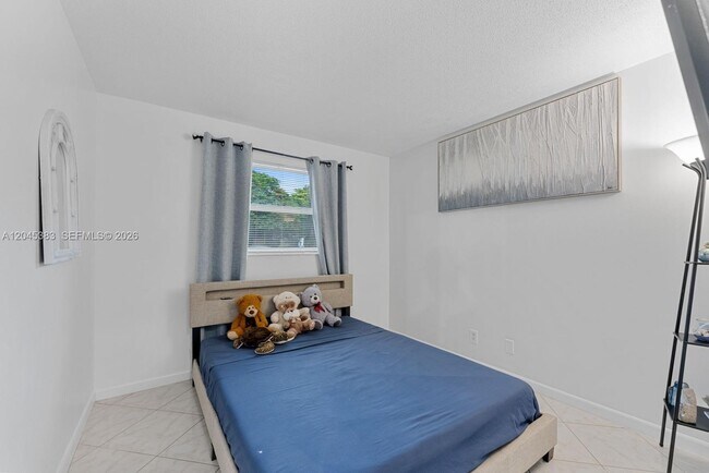 Building Photo - 9508 N Military Trl