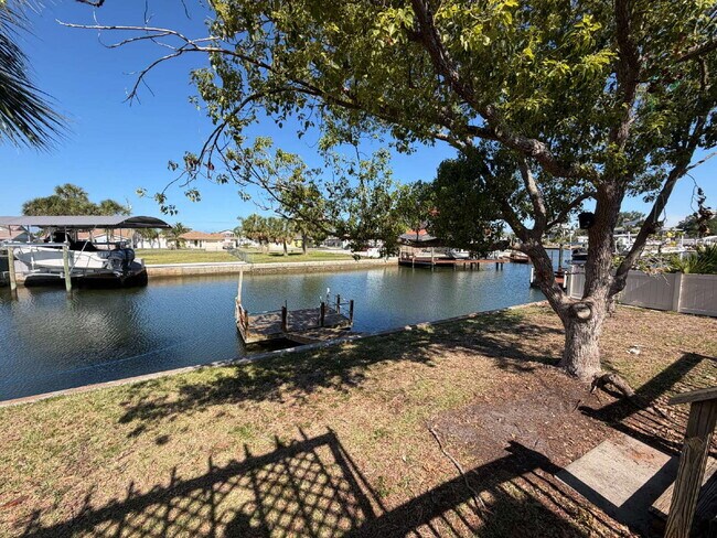 Building Photo - "Waterfront Home with Dock! 3-Bedroom Oasis with 2 Baths and 1,800 Sq Ft of Comfort in Hudson, FL!"