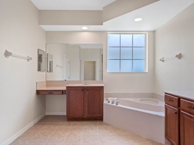 Building Photo - Spacious 4-Bedroom Pool Home with 3 Full B...