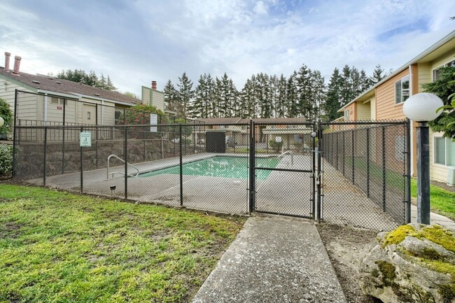 Building Photo - AVAILABLE NOW! 2BR/2BA Condo – Awesome Location! Glossy Hardwoods, Granite Countertops, W/S/G Inc...