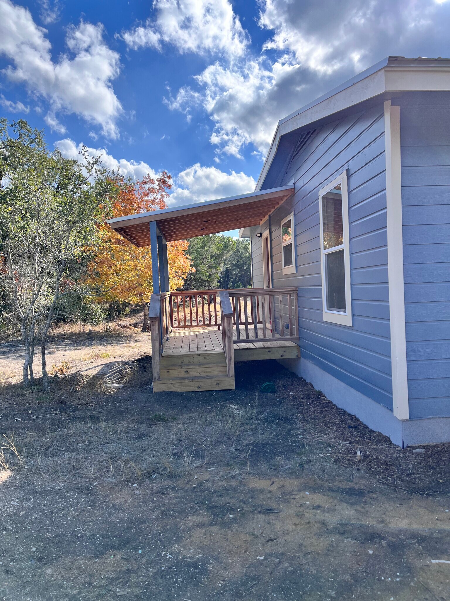 Back porch and side door dded to enjoy the beautiful scenery - 1565 Pump Station Rd