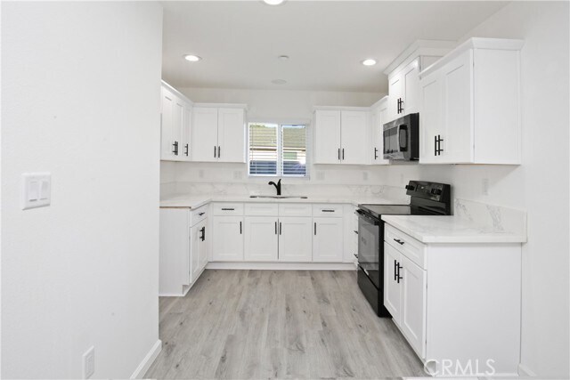 Building Photo - 6147 Palm Ave