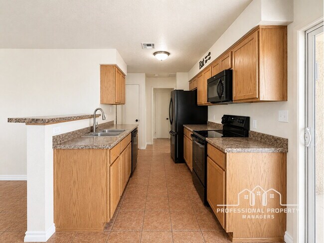Building Photo - “Cozy 3-Bedroom, 2-Bathroom Home in Desert Oasis”