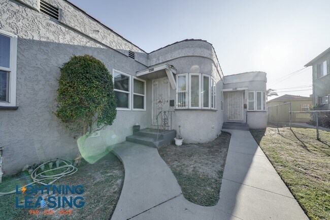 Building Photo - 6415 S Van Ness Ave