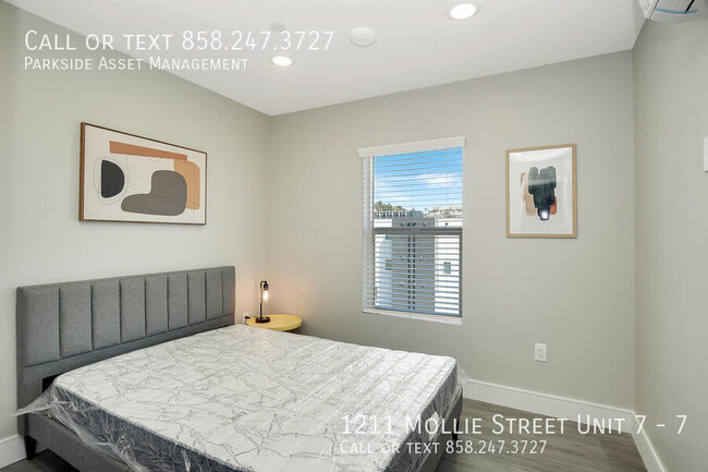 Building Photo - $1,000 Move-in Credit! The Carl on Lauretta