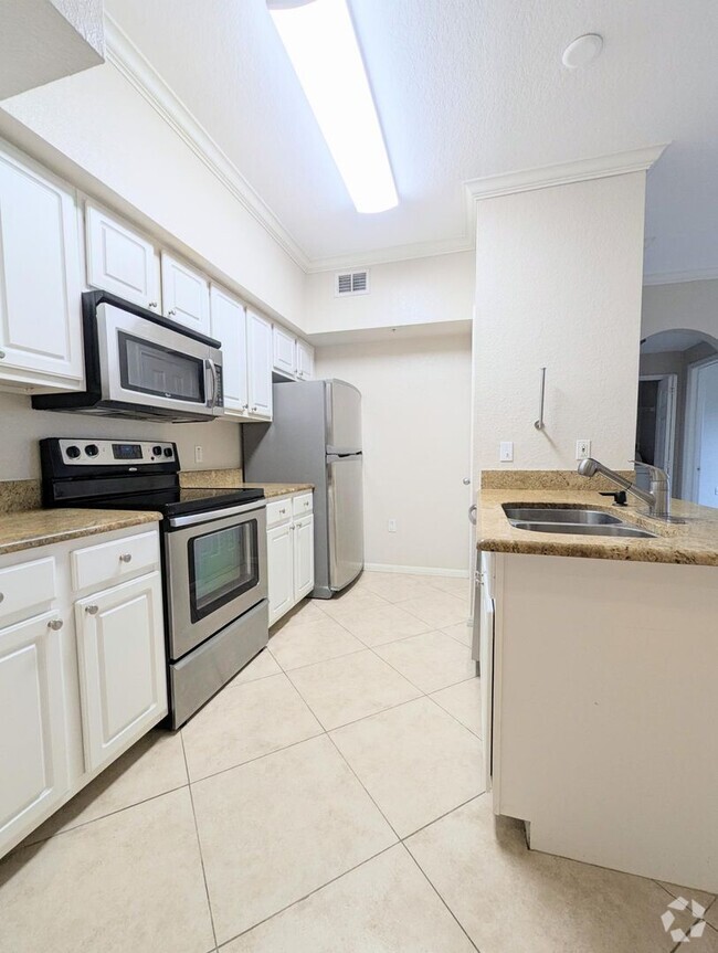 Building Photo - 2x2 Spacious, updated 5th floor unit with ...