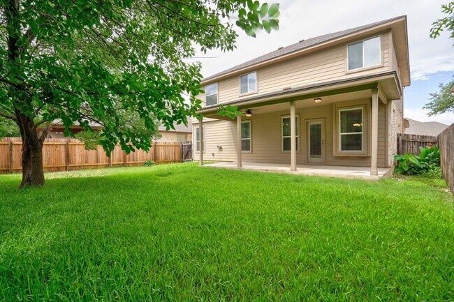 Building Photo - Bright & Roomy 4BR • 2.5BA • Two-Level Living