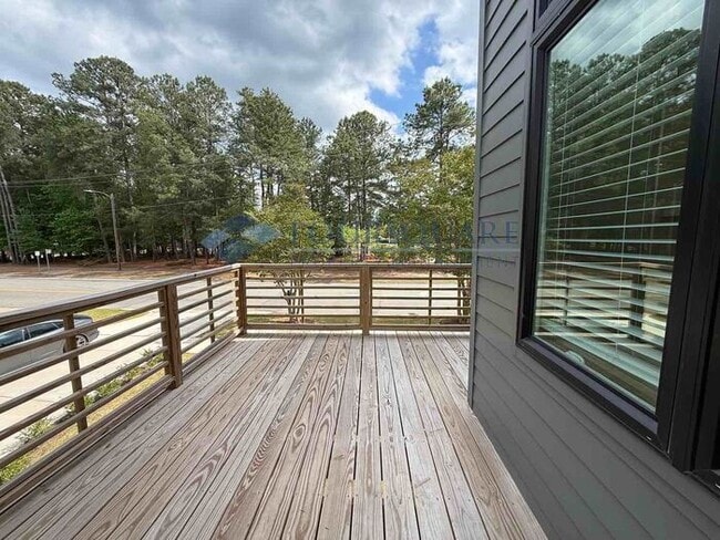 Building Photo - Modern 4-Bed / 4-Bath Townhome with Covered Patio, Deck & Garage – Inside the Beltline Near Downt...