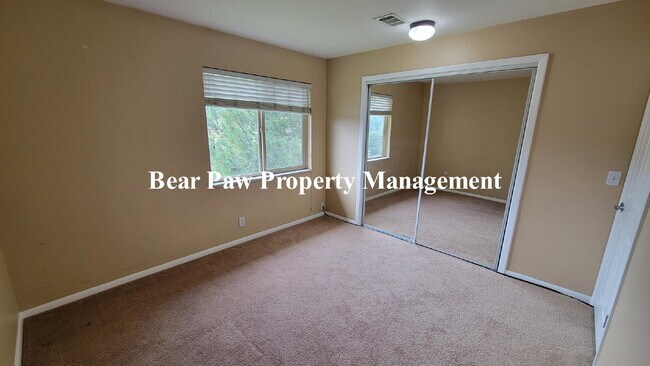 Building Photo - "Charming 2-Bed Condo with Cozy Fireplace in Scenic Evergreen!"