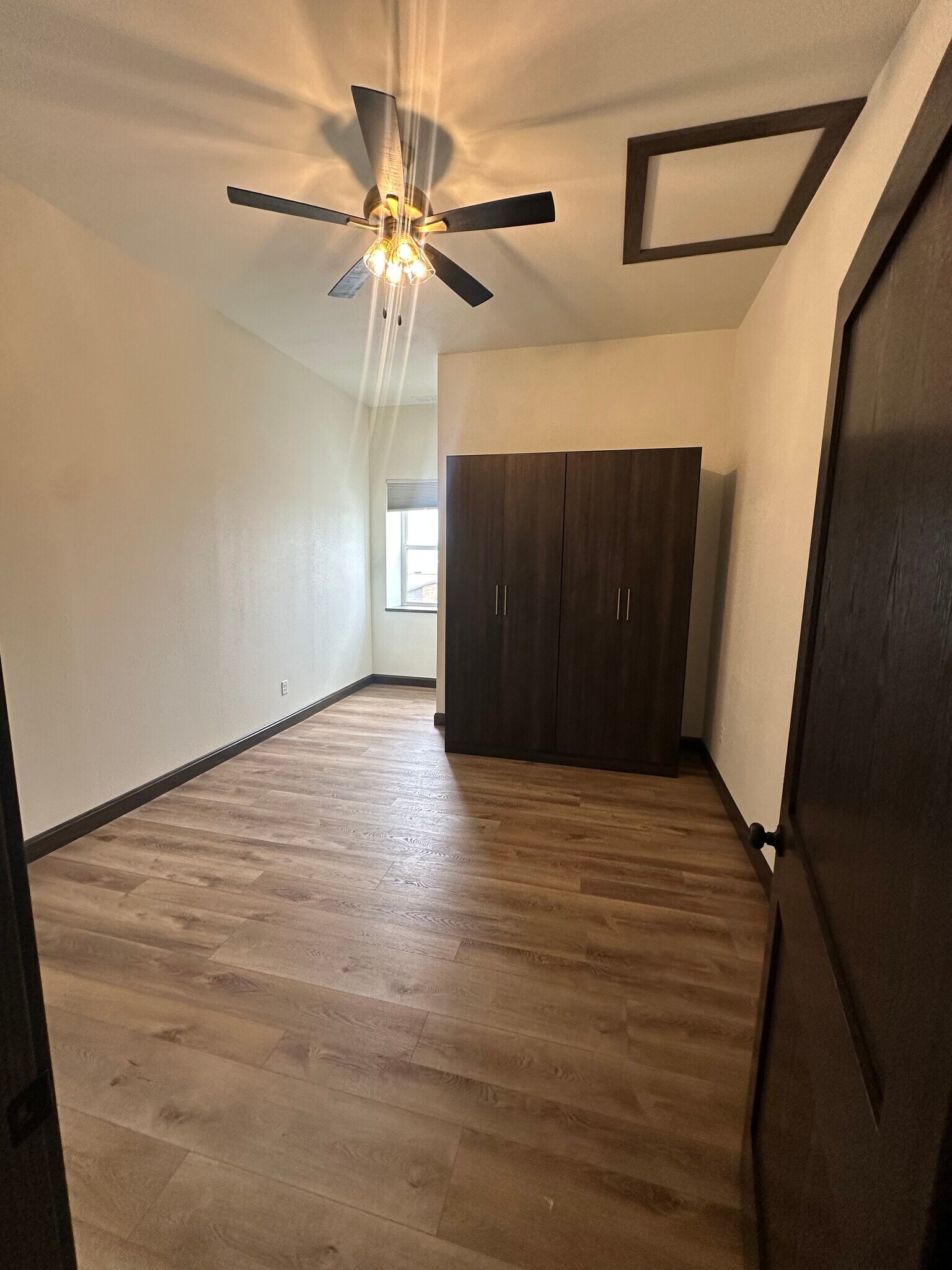 Bedroom two with wardrobe. - 210 S Main St