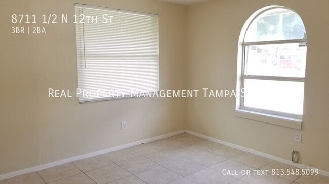 Building Photo - 8711 1/2 N 12th St-