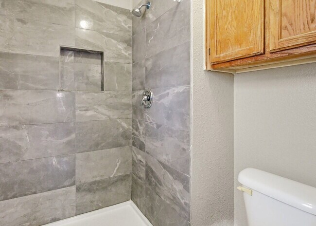 Building Photo - Corner-Lot Garden Home with Fireplace and Private Patio