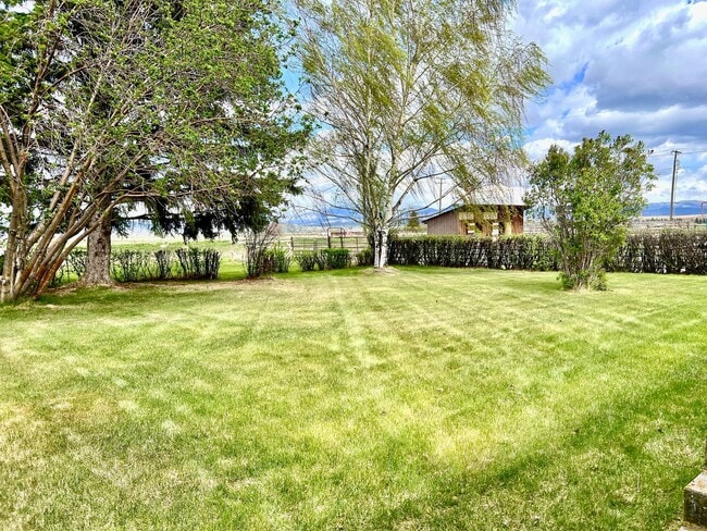 Building Photo - Pet Friendly 2 Bed 2 Bath Single Family Home With Garage, Private Deck and Big Yard!
