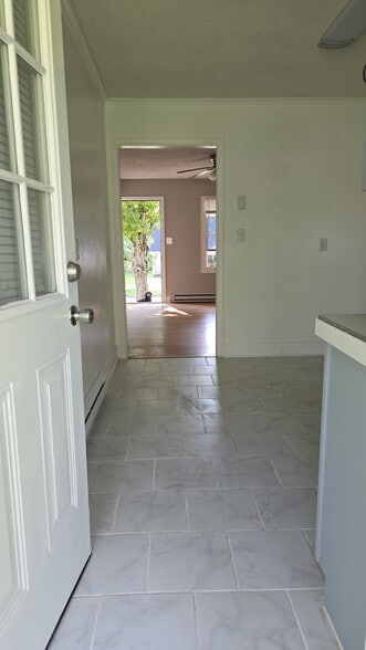 Tiled kitchen. Open and bright, lots of light. - 511 Reid St