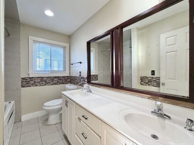 Building Photo - Solid Brick and Renovated with New Kitchen and Two Full Baths!