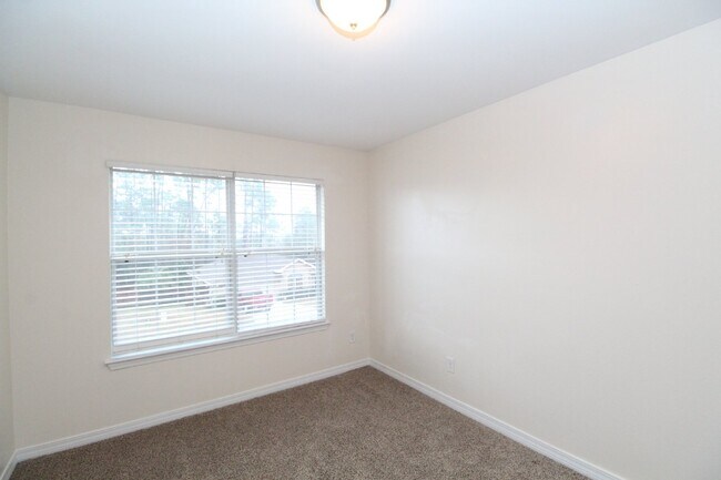 Building Photo - Spacious 4BR Home in Robin's Ridge with Soaring Ceilings, Guest Suite & Two-Car Garage