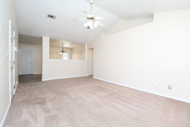 Building Photo - "Spacious 3-Bedroom Brick Home with Fenced...