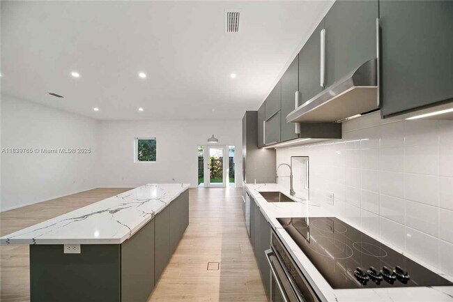 Building Photo - Northwest 9th Court, Miami, FL 33127 - 5 BR 3 BA townhouse