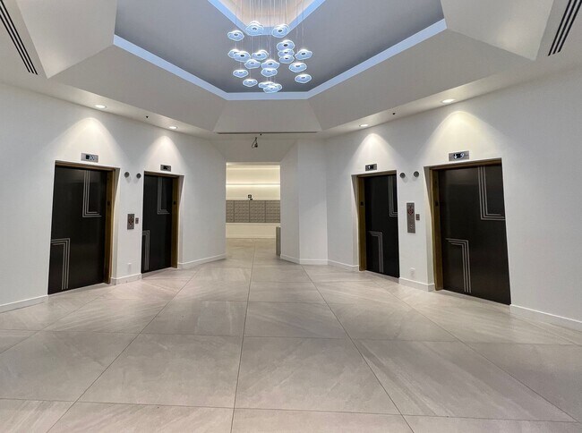 Building Photo - Contemporary condo on the 10th floor inclu...
