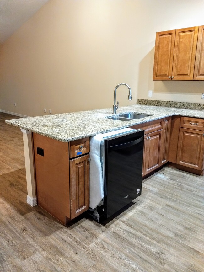 Kitchen - New Appliances being installed - 9356 N Peachtree Way