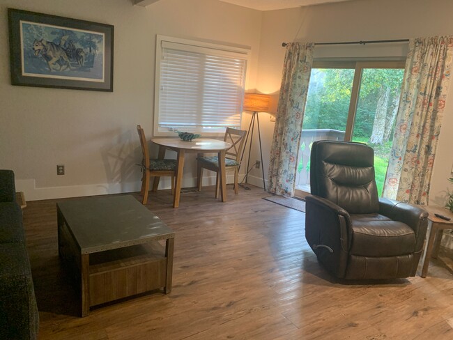 Living Room and Dining Room with back deck - 4703 Mills Dr