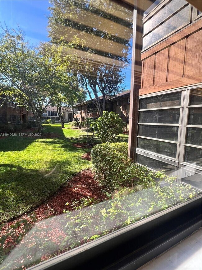 Building Photo - 4970 NW 102nd Ave