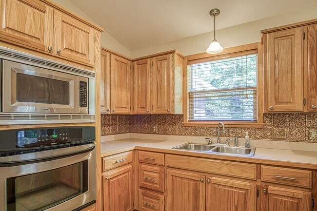 Building Photo - This beautiful home is located in a quiet private neighborhood and perfect for a serene living at...