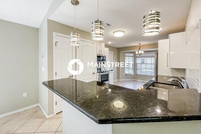 Building Photo - 4 Bedroom Pet-Friendly Home in SPRING HILL...