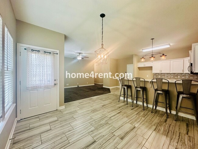 Building Photo - Ranch Style Home w/ Updated Kitchen, including SS Appliances and Granite Counters Plus a Large Un...