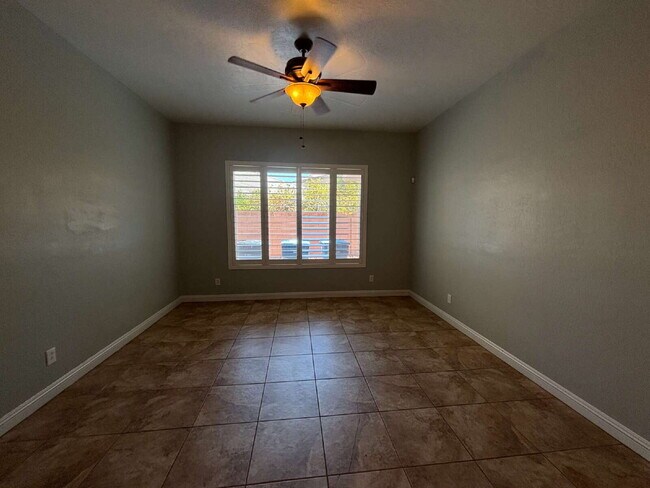 Building Photo - 5-Bed Retreat with Granite Elegance & Cozy Fireplace – 3690 Sq Ft of Comfort in Las Vegas with a ...