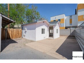 Building Photo - Experience Modern City Living In This Effi...