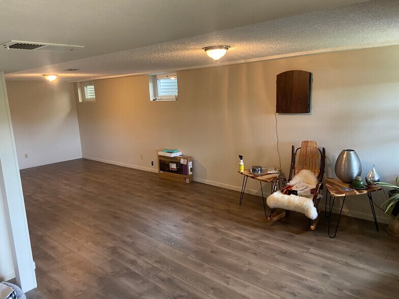 Basement living room - 8520 W 81st Dr