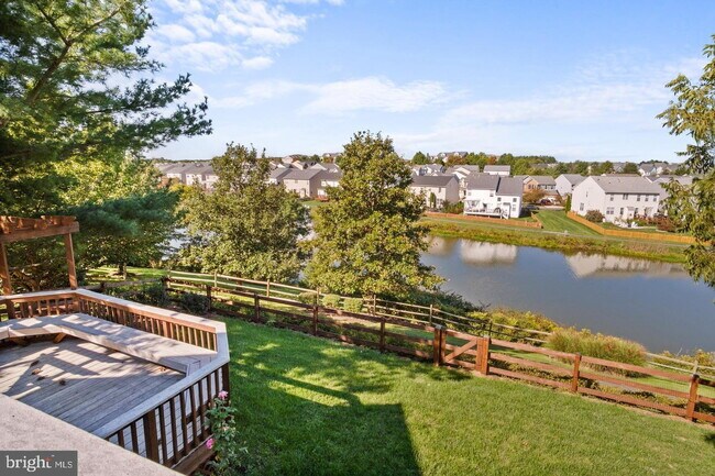 Building Photo - Spacious 4-Bedroom Home with Lake Views & Finished Basement
