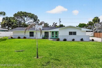 Building Photo - Welcome to this beautifully remodeled 4-bedroom, 3-bath home in the heart of Indialantic Beach!