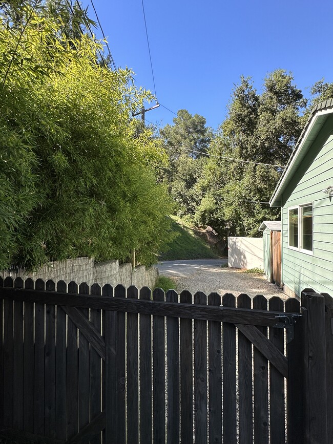 Entry from street, parking area - 19876 Observation Dr