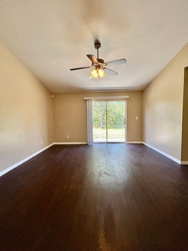 Building Photo - Charming 3BR/2BA Lehigh Acres Duplex with 1-Car Garage | Lawn Care & Salt Service Included