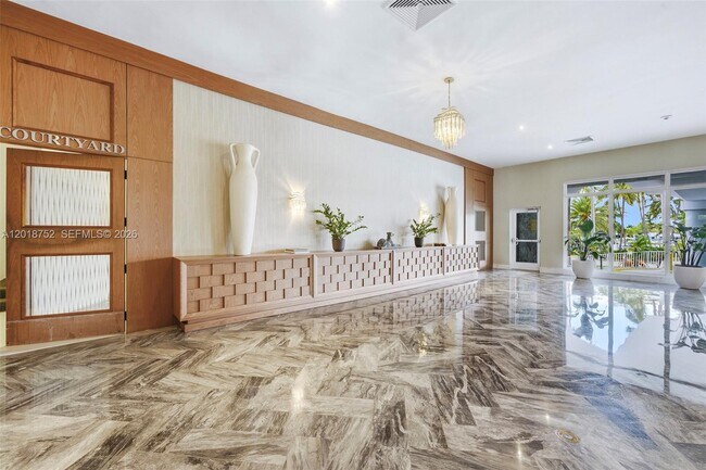 Building Photo - 5401 Collins Ave