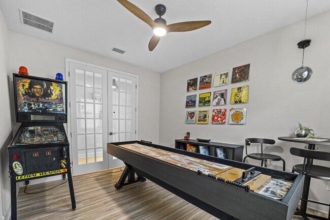Building Photo - "Luxurious Furnished Home with 4-Bed, 3-Bath, Swim Spa Fenced Yard Golf Cart steps to the beach!"