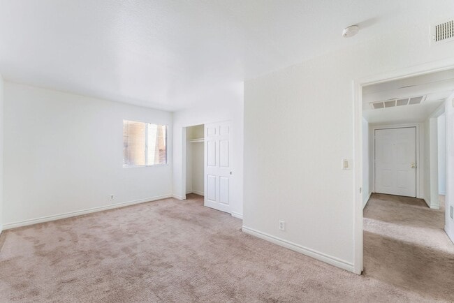 Building Photo - Guard-Gated Condo Living with Resort-Style Community Amenities!