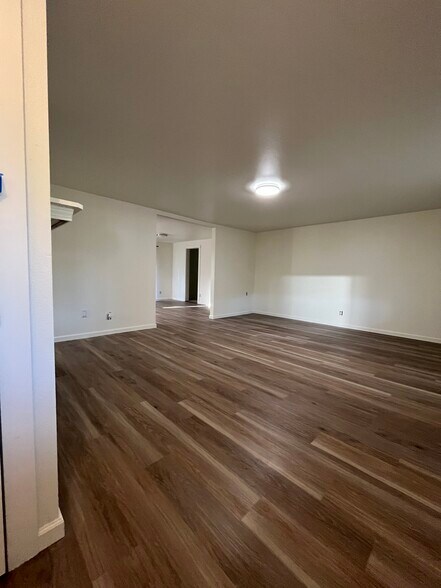 View of living room from Front door. (Coat closet) - 2143 SE Douglas Ave