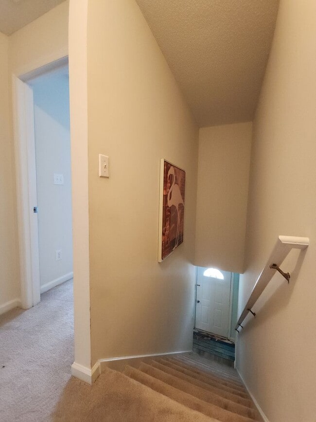 Building Photo - Welcome to our charming townhouse in Pelle...