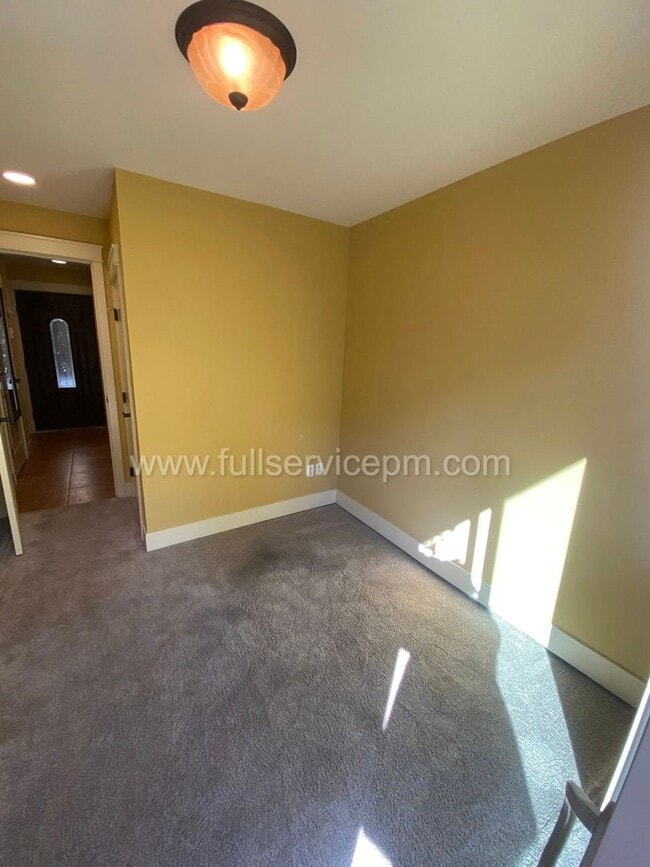Building Photo - Spacious townhome with private backyard, garage parking, multiple decks, and a dedicated home off...