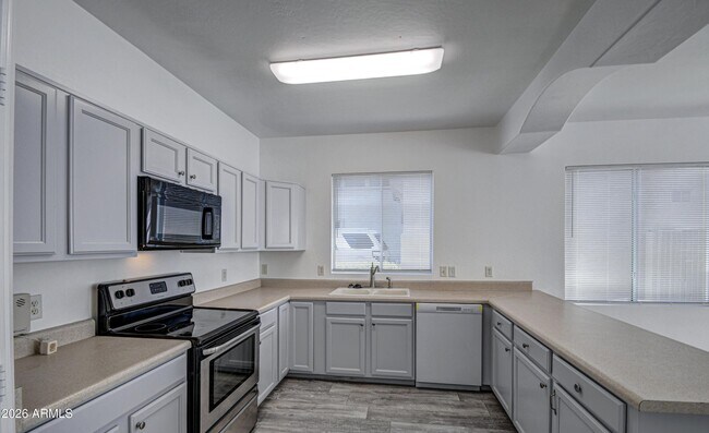 Building Photo - 12031 W Belmont Dr