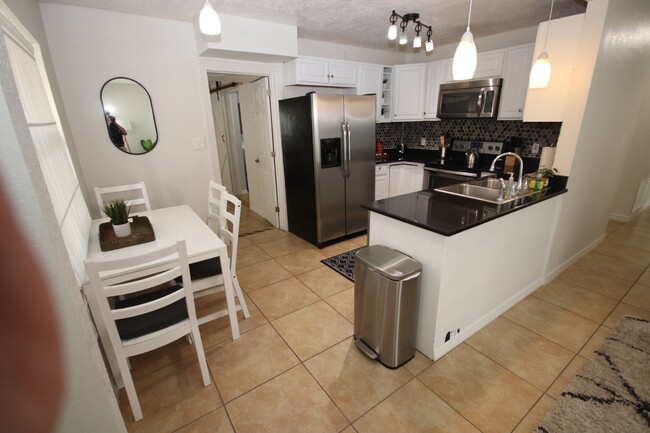 Building Photo - Incredible, completely remodeled FURNISHED...