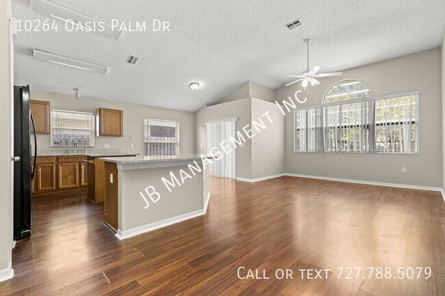 Building Photo - 10264 Oasis Palm Dr