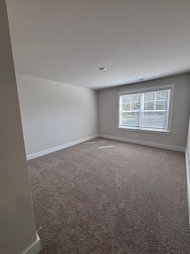 Building Photo - Brand new three-bedroom, 2.5-bath townhome