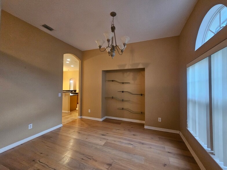Open floor plan; formal dining room - 3615 Soft Breeze Cir